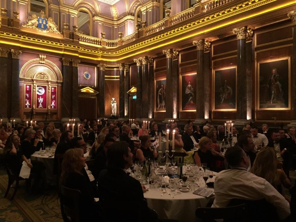 Guests listening to guest speaker, former F1 Winner Mark Webber